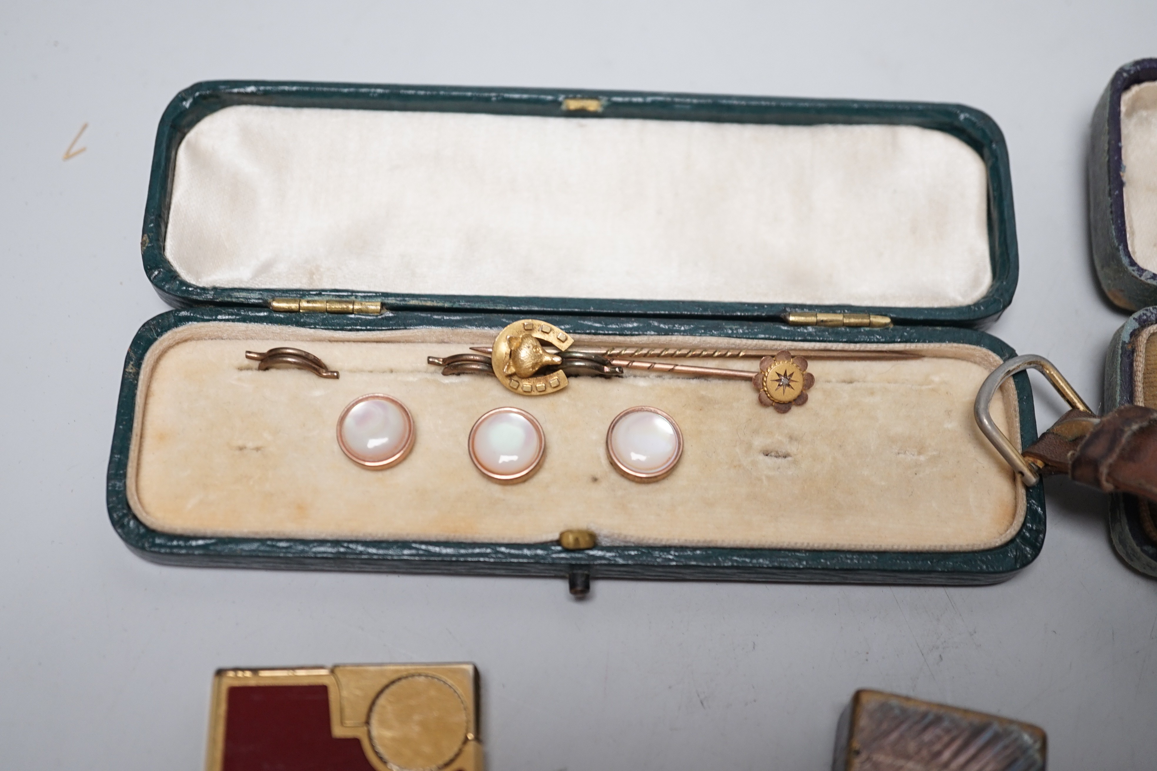 Mixed jewellery and other items including a 15ct fox head and horseshoe stick pin, a 9ct and diamond chip set stick pin, gem set yellow metal bar brooch, dress studs, lighters, lady's Rotary wrist watch, etc.